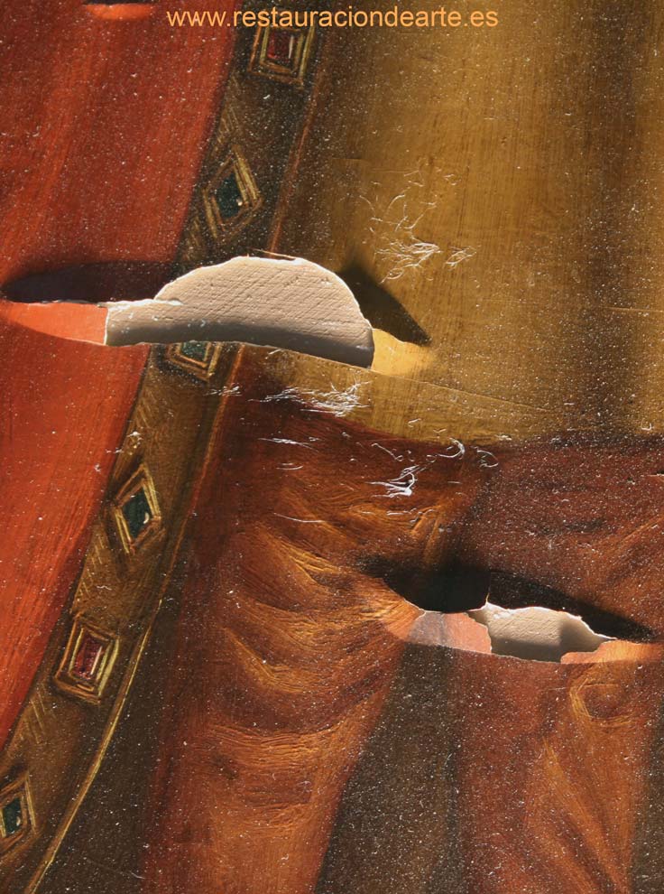 detalle del deterioro antes de la restauración de la pintura, restauración de pintura sobre tabla, deterioros de la capa pictórica con faltas de policromía